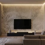 Fototapeta beżowa z motywem roślinnym na wymiar na ścianie telewizyjnej w nowoczesnym salonie z kinem domowym.